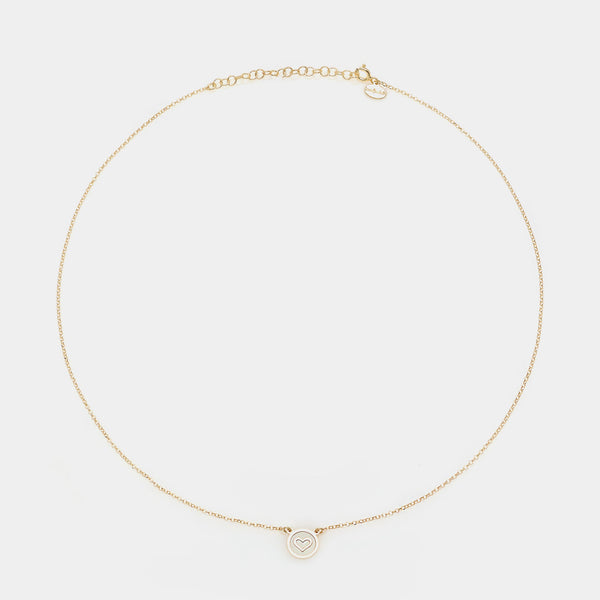 Gold-plated silver necklace with heart disc centerpiece