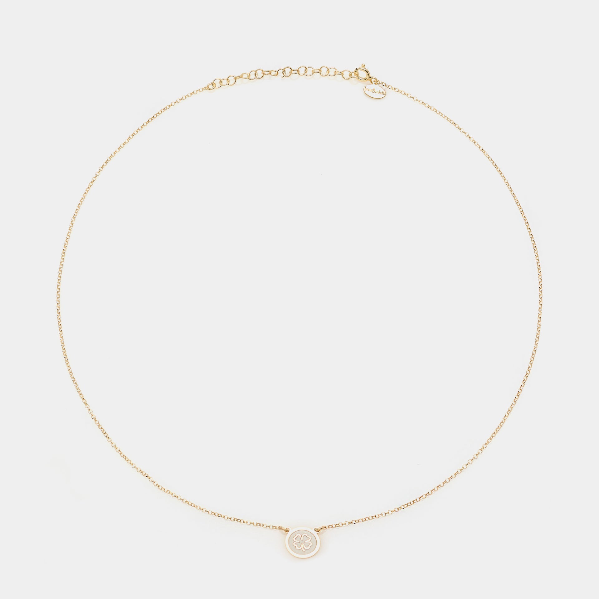 Gold-plated silver necklace with central disc and four-leaf clover