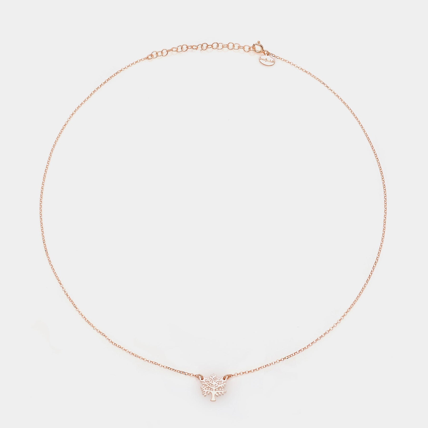 Rose gold silver necklace with pierced tree centerpiece