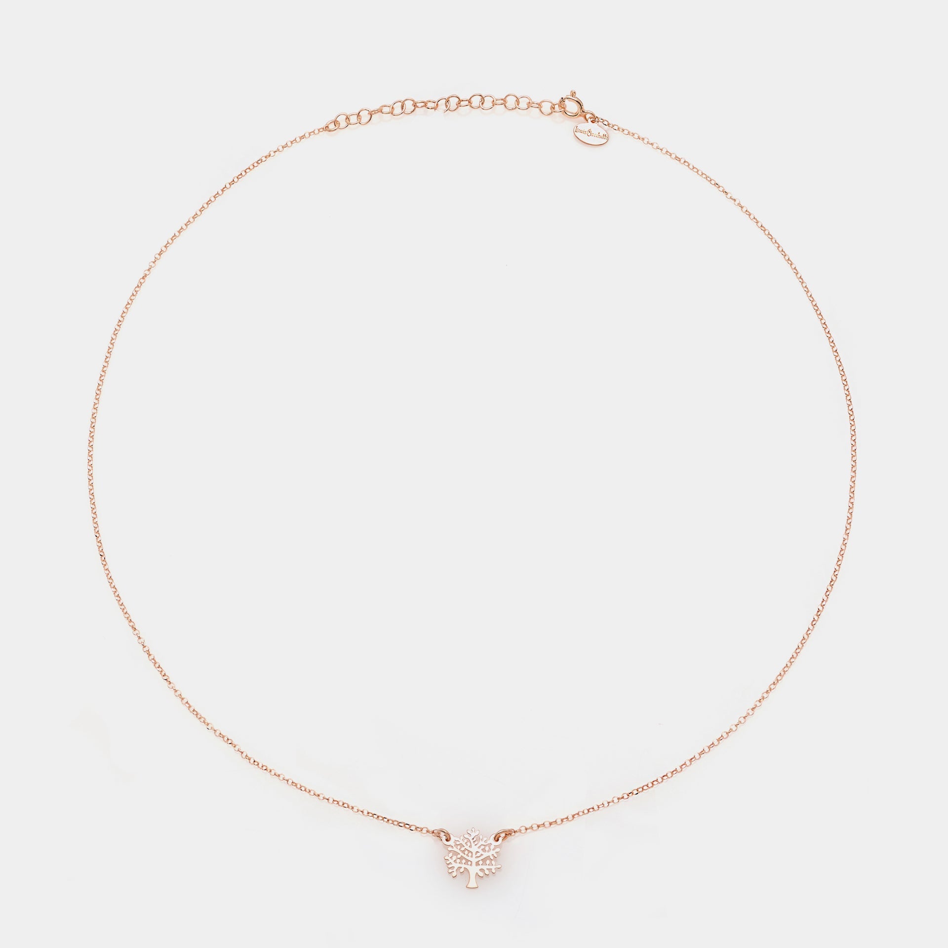 Rose gold silver necklace with pierced tree centerpiece