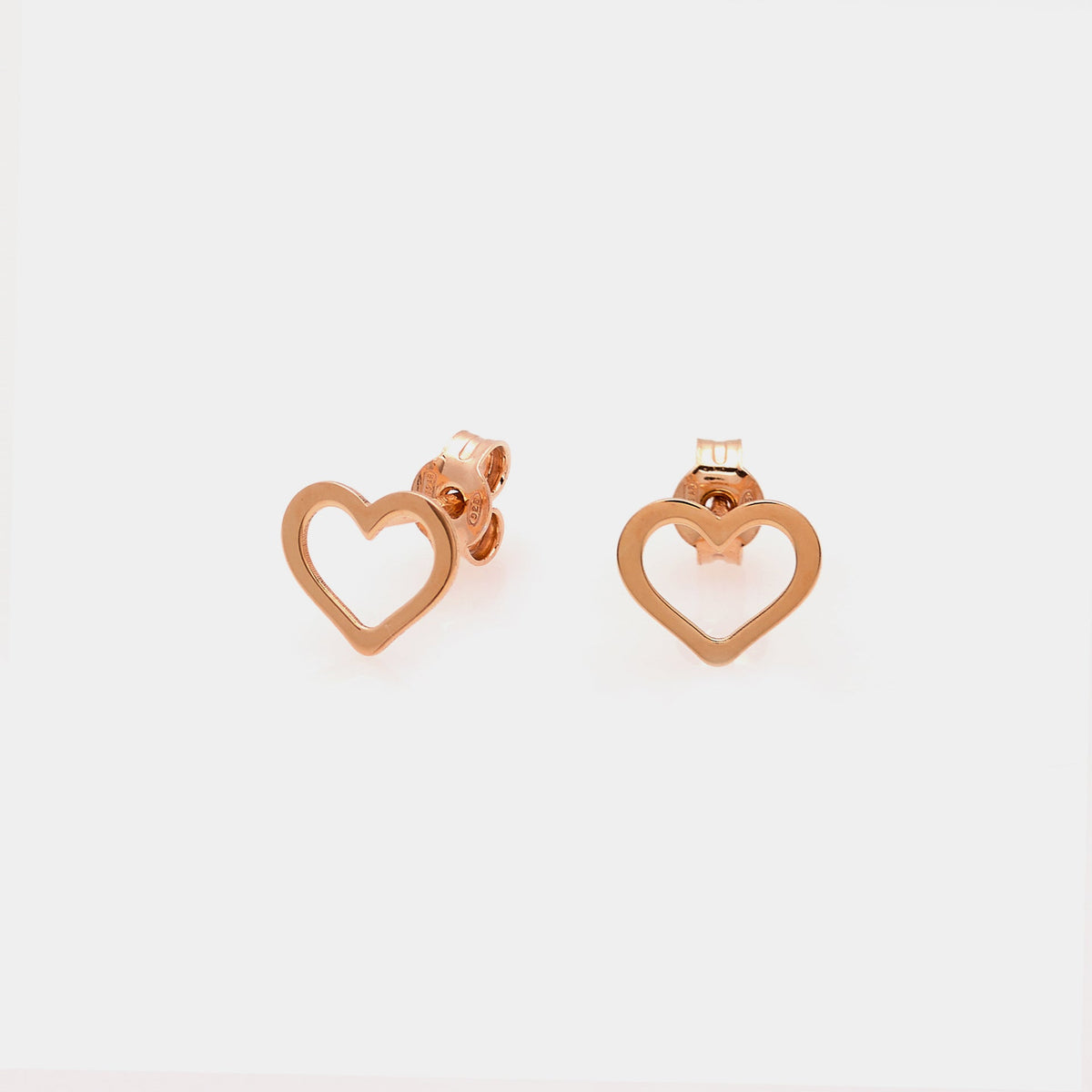 Rose gold plated stud earrings with pierced heart