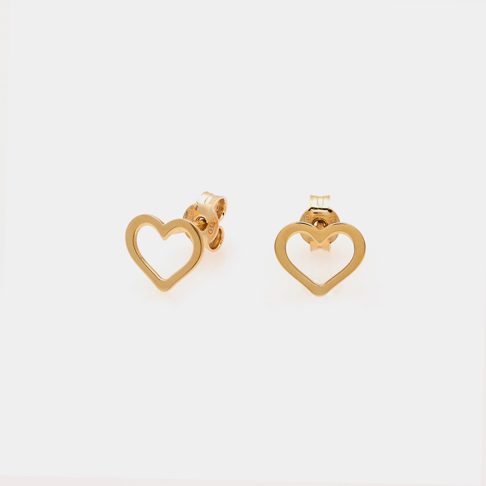 Gold-plated silver stud earrings with pierced heart