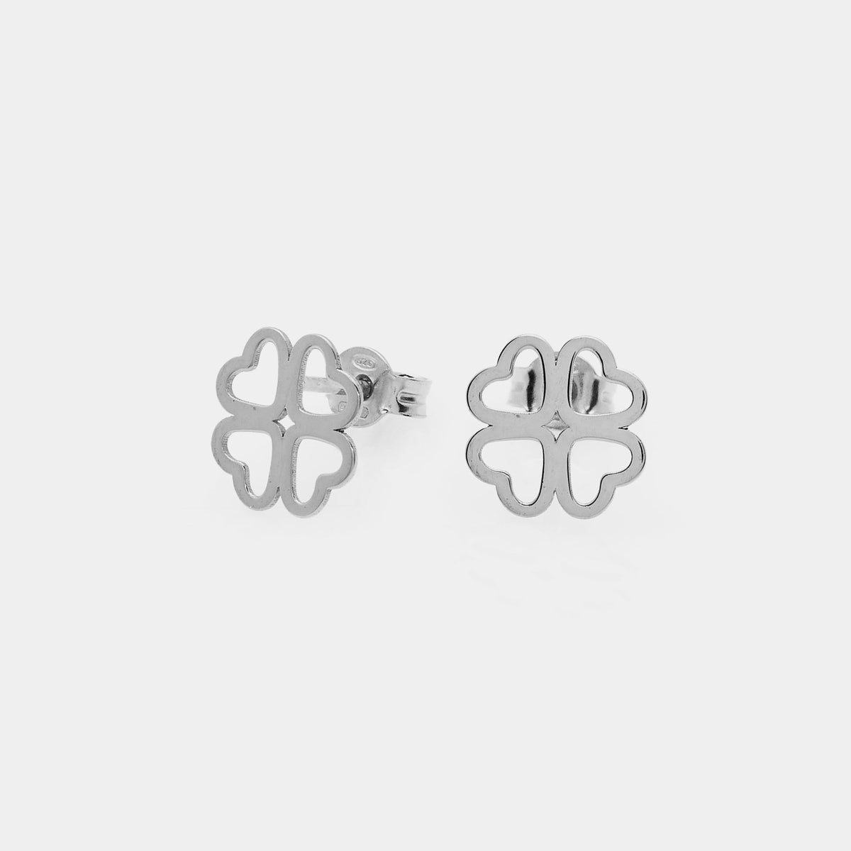 Rhodium-plated silver stud earrings with heart-shaped perforated petals