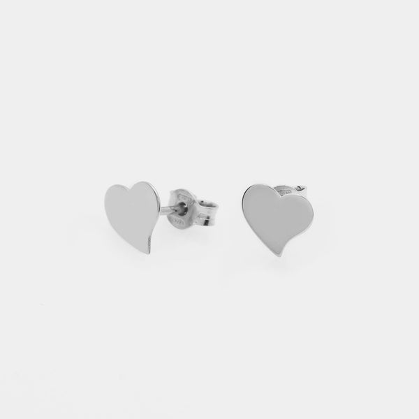 Rhodium-plated silver stud earrings in twisted heart shape