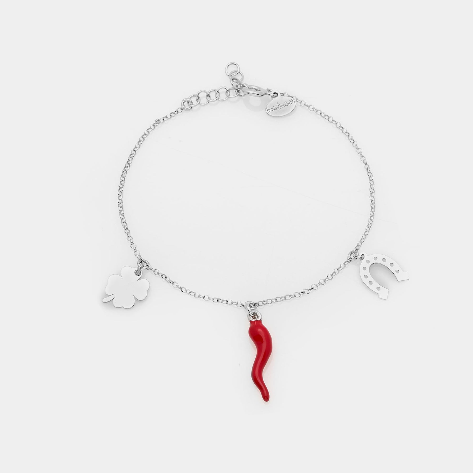 Bracciale argento rodiato con corno smaltato, quadrifoglio e ferro di cavallo pendenti