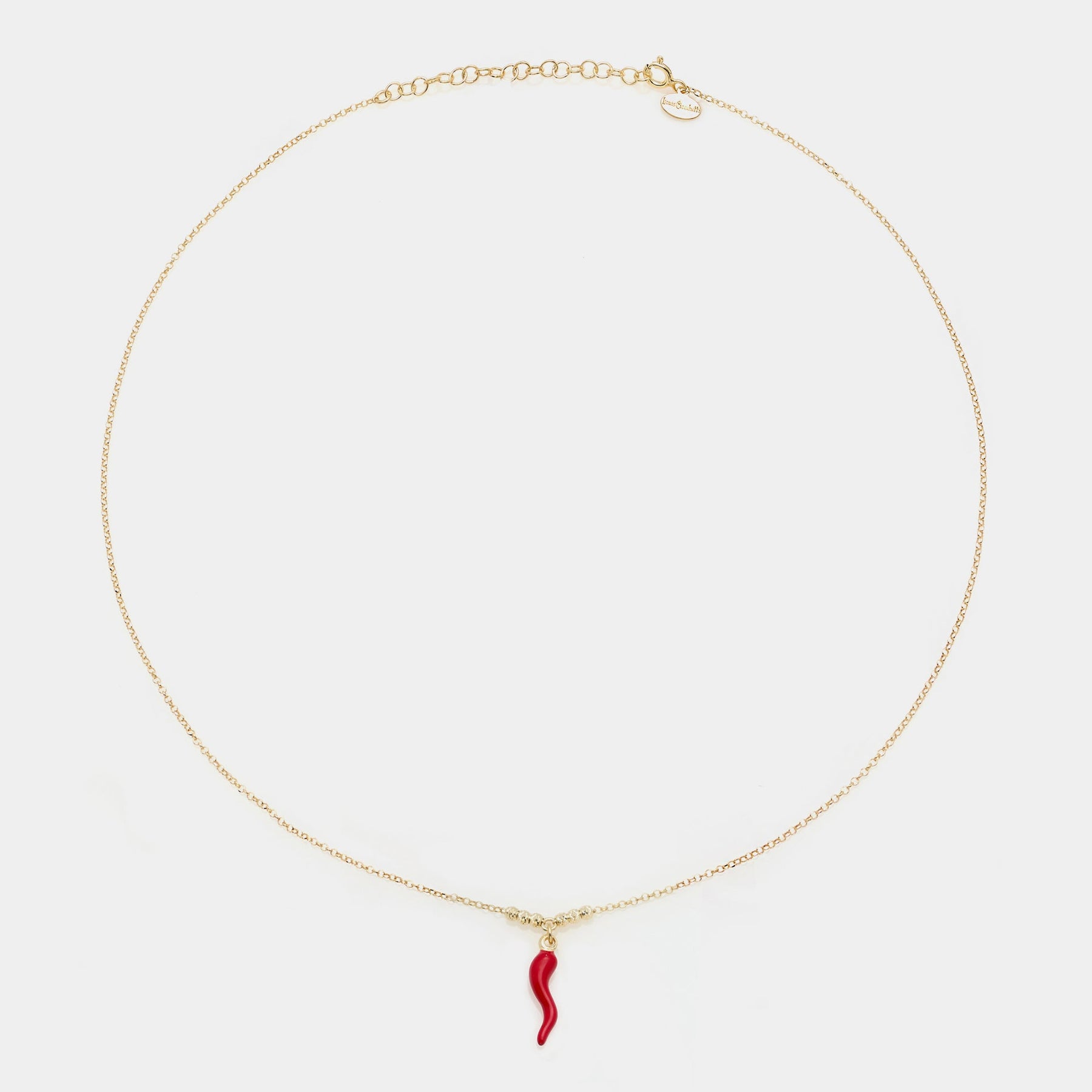 Gold-plated silver necklace with enameled horn pendant and 3 faceted spheres on the sides