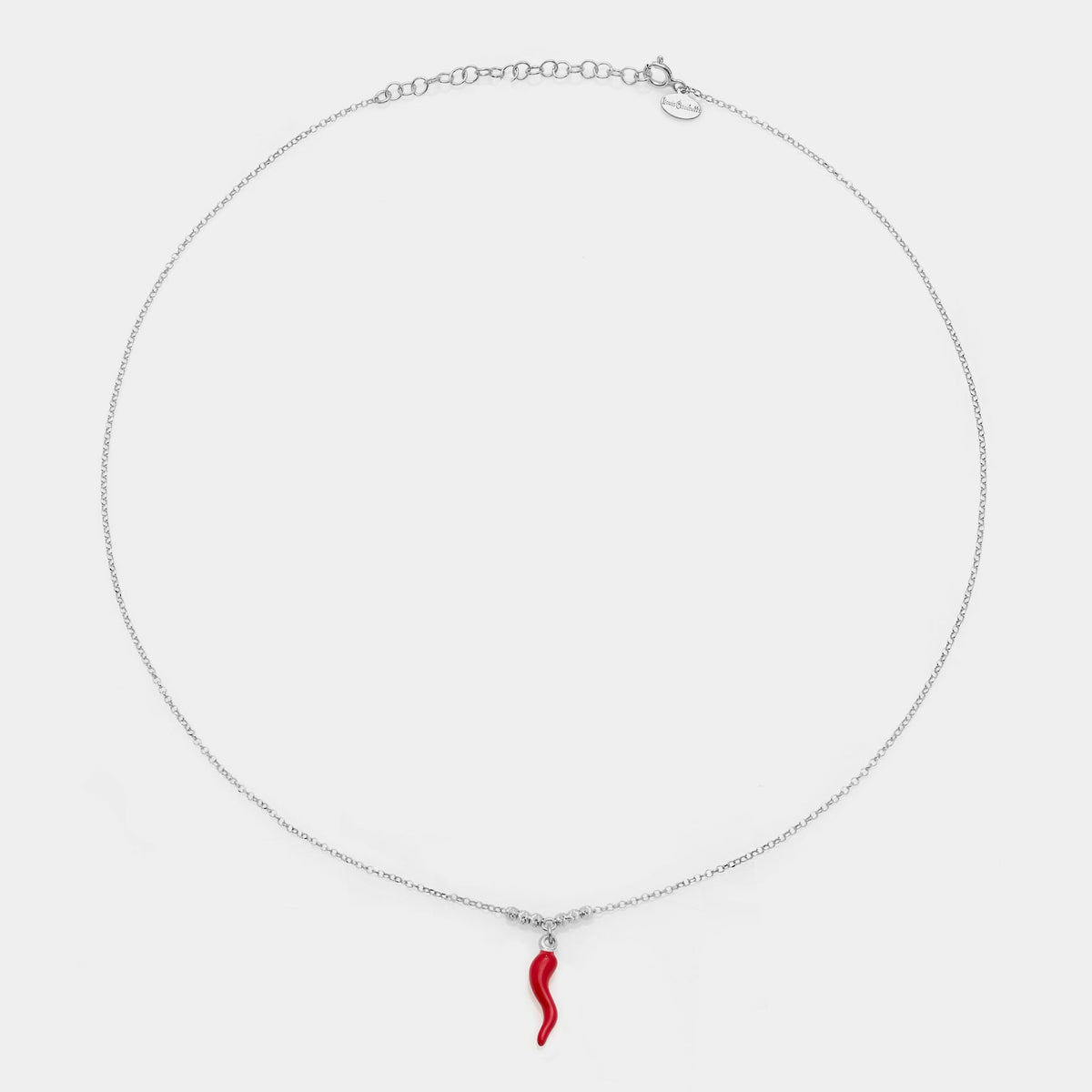 Rhodium-plated silver necklace with enameled horn pendant and 3 faceted spheres on the sides
