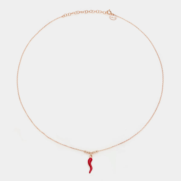 Rose gold silver necklace with enameled horn pendant and 3 faceted spheres on the sides