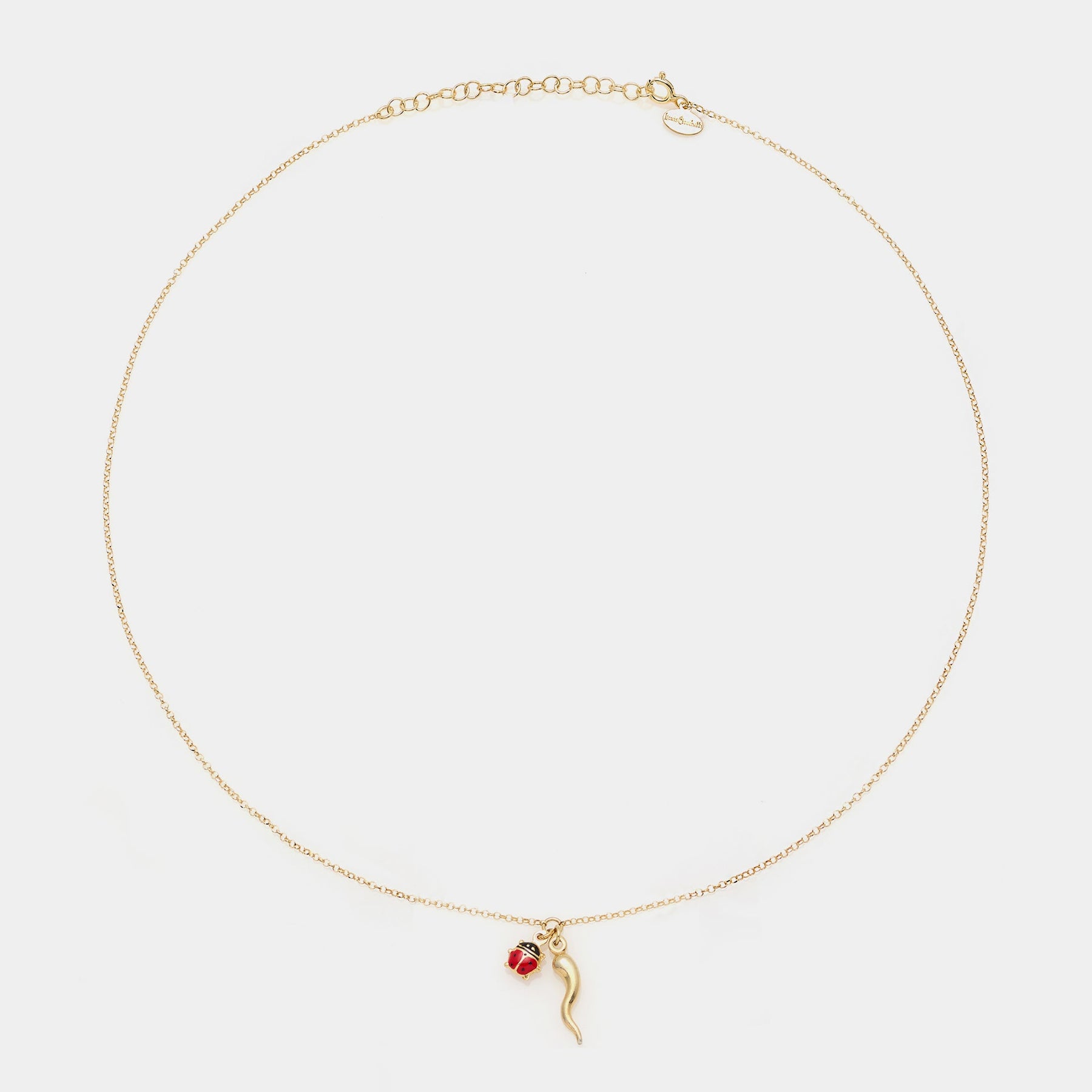 Gold-plated silver necklace with horn centerpiece and enamel ladybug pendants
