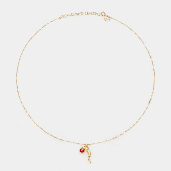 Collana argento dorato con centrale corno e coccinella smaltata pendenti