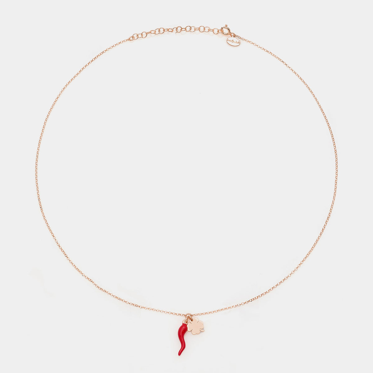 Collar de plata rosa con centro de cuerno esmaltado y colgantes de trébol