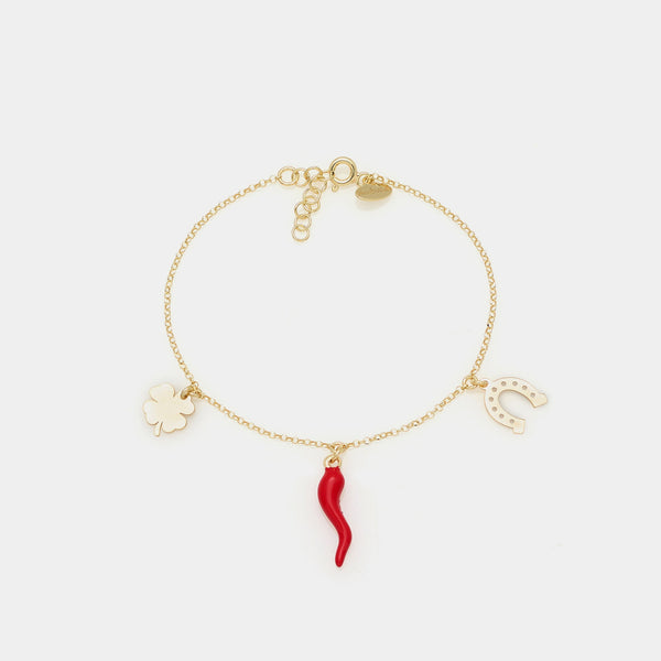 Pulsera de plata chapada en oro con colgantes de cuerno esmaltado, trébol y herradura