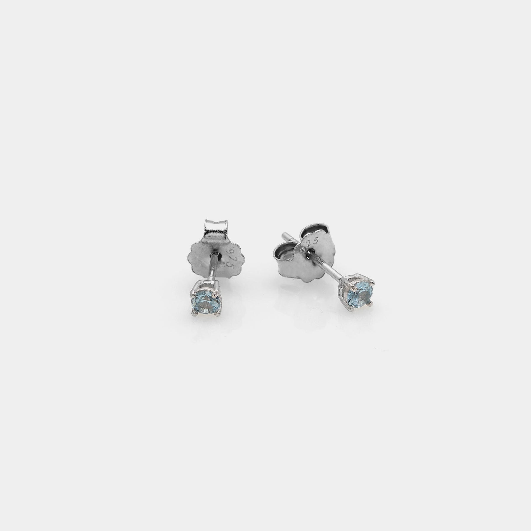 Rhodium-plated silver earrings with light point and light blue zircons mm 30
