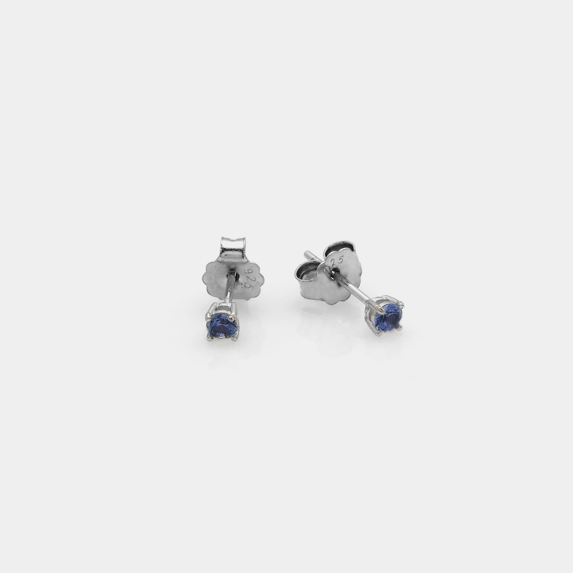 Rhodium-plated silver earrings with blue zircons mm 30