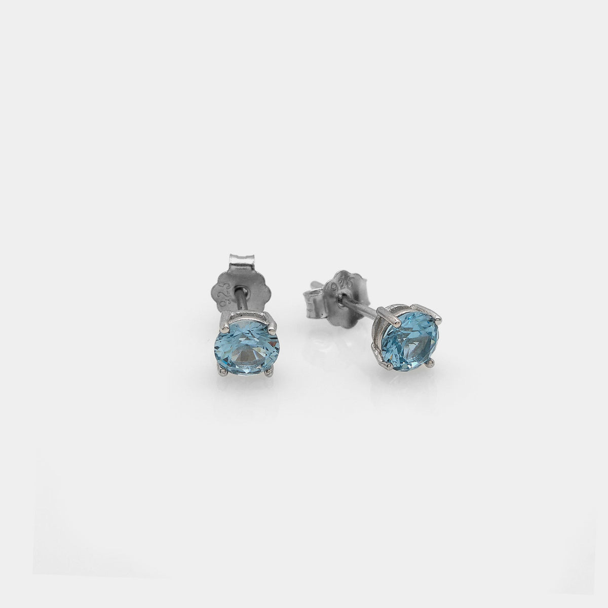 Rhodium-plated silver earrings with light point and light blue zircons mm 50
