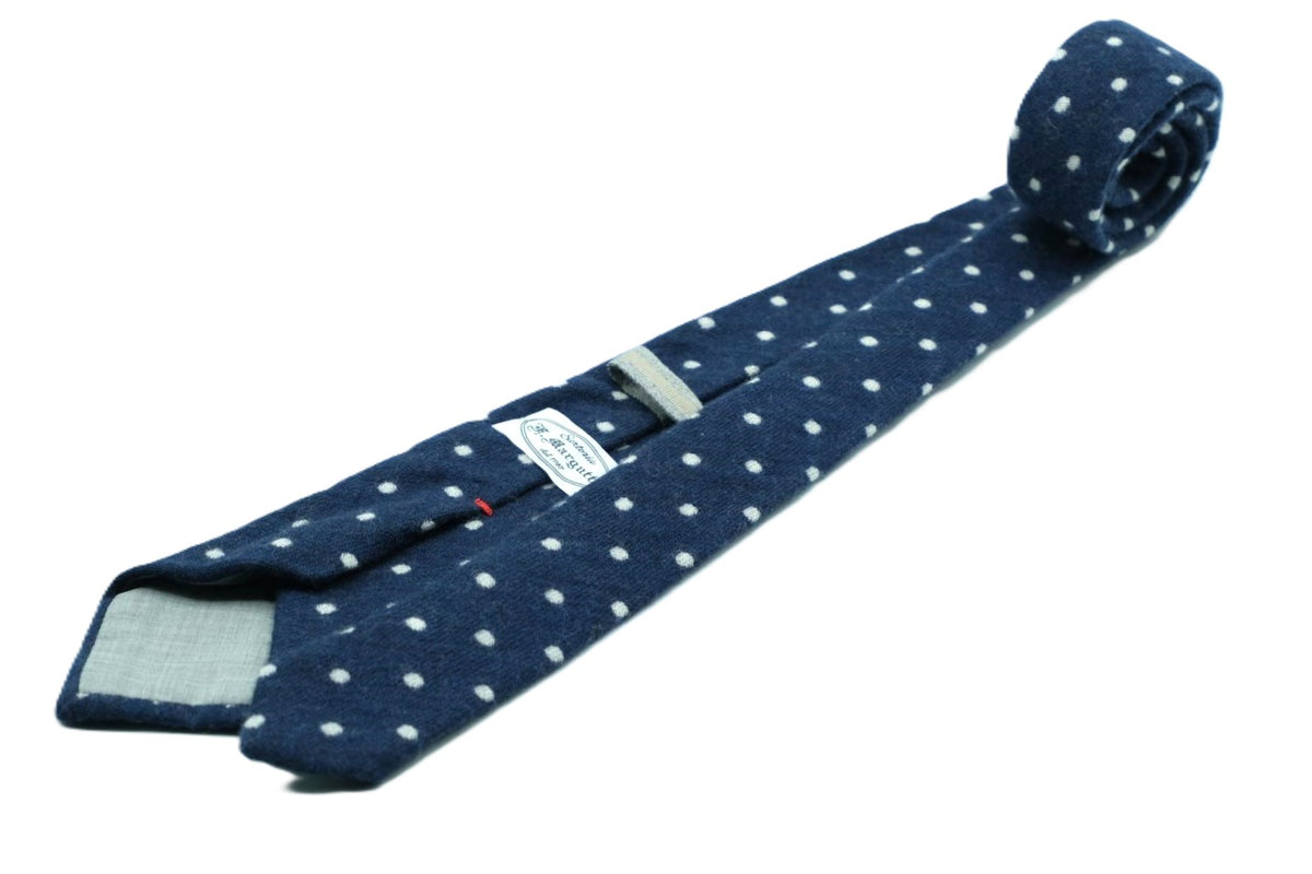 Blue wool tie with white polka dots