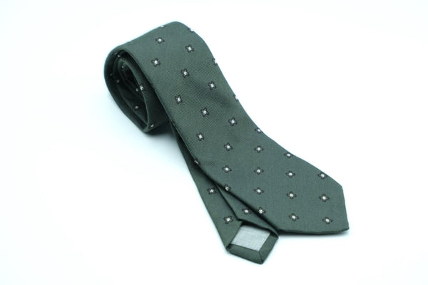 Green silk tie with geometry