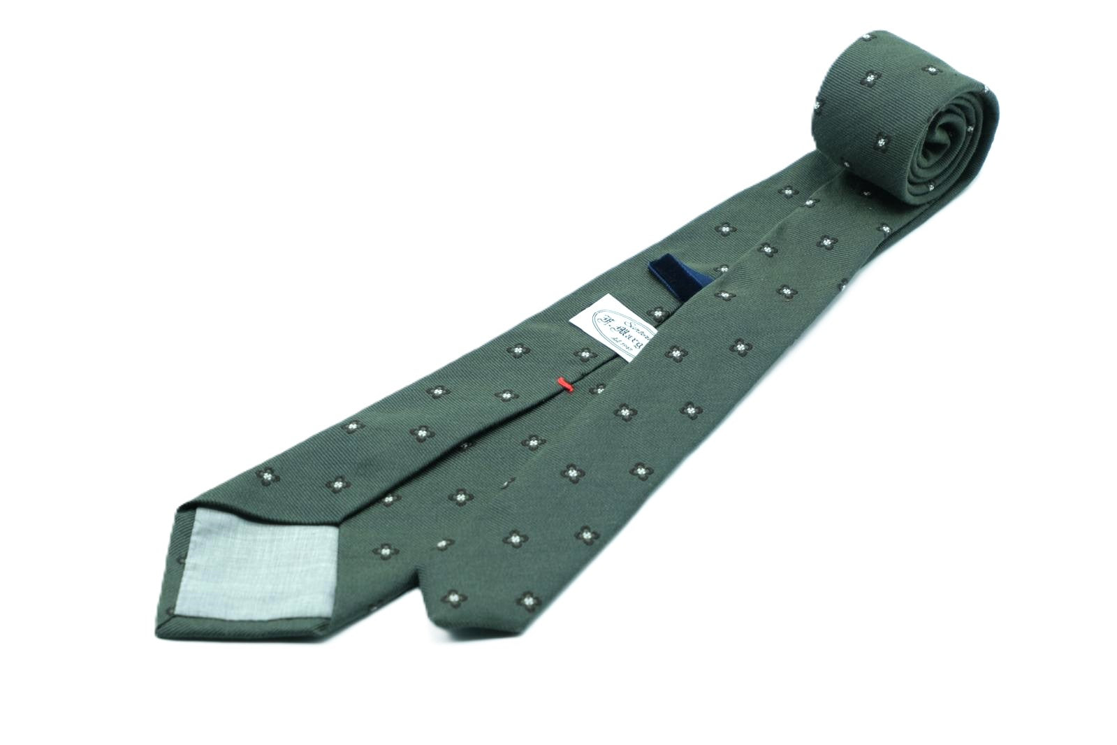 Green silk tie with geometry