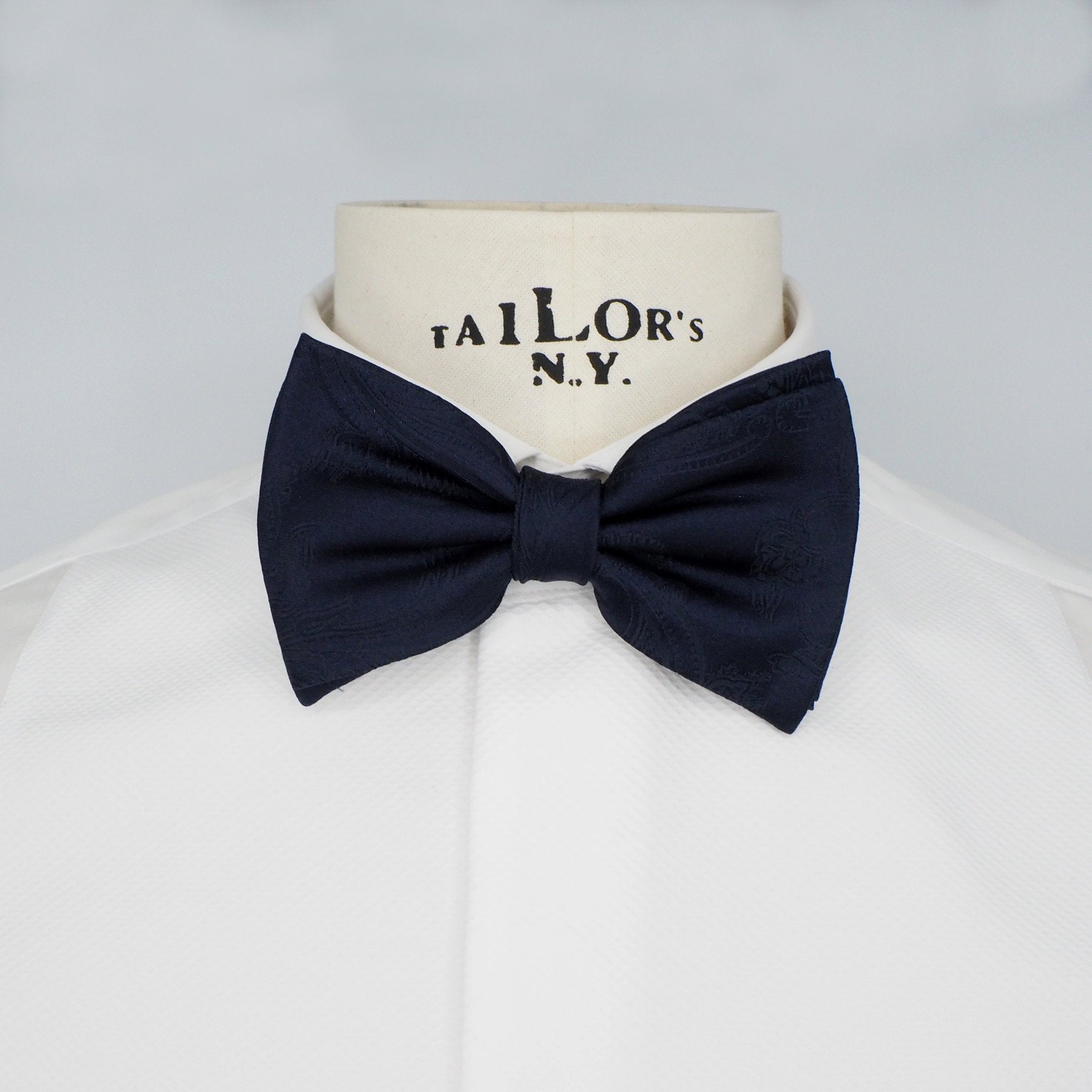 Embroidered blue bow tie
