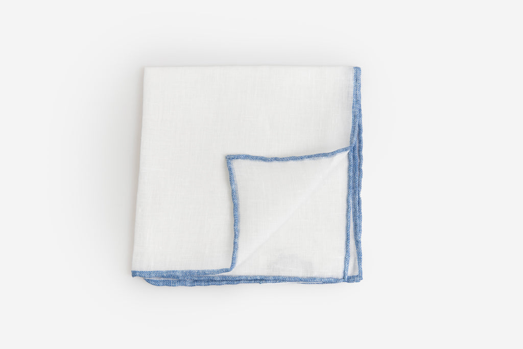 White linen clutch with blue border