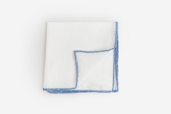 White linen clutch with blue border