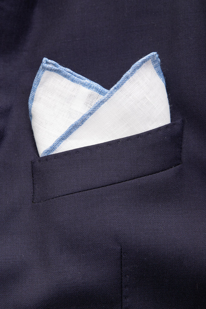 White linen clutch with blue border