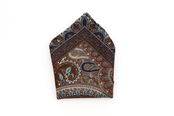 Beige clutch with red and blue pattern in pure silk