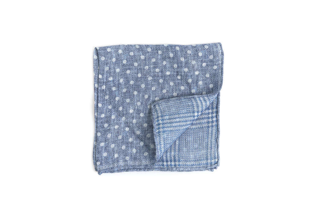 Light blue clutch with white polka dots in linen/cotton