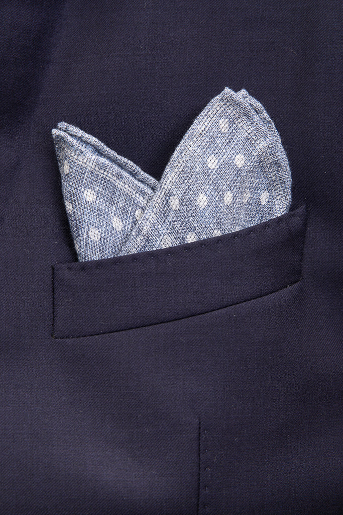Light blue clutch with white polka dots in linen/cotton