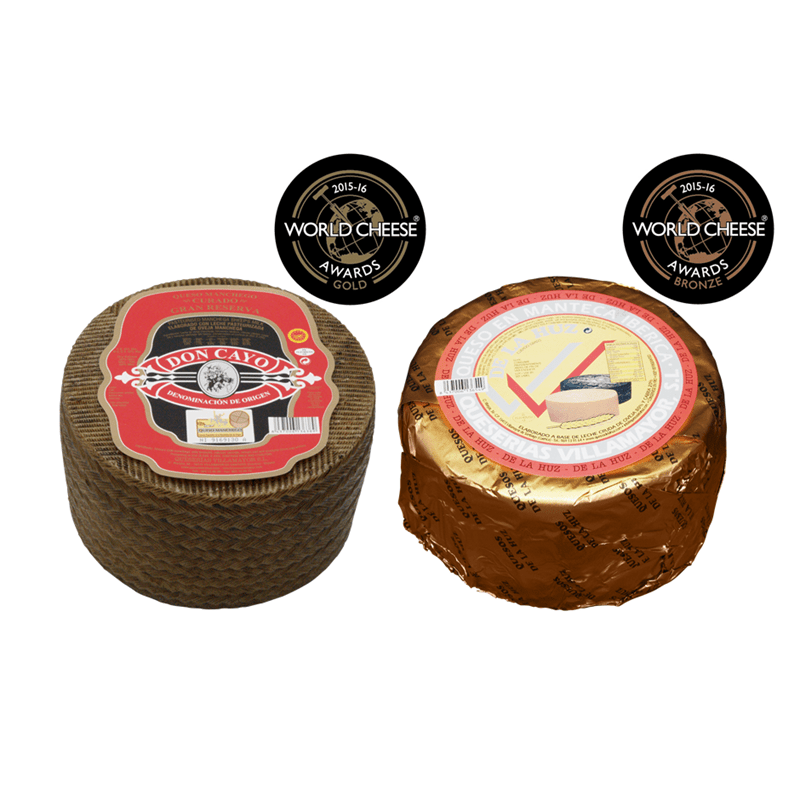 Assortment of 2 Cheeses World Cheese Awards: Don Cayo Curado Grande (3Kg) Manchego D.O.P. + De la Huz de Oveja-Cabra Curado en Manteca Grande (3Kg)