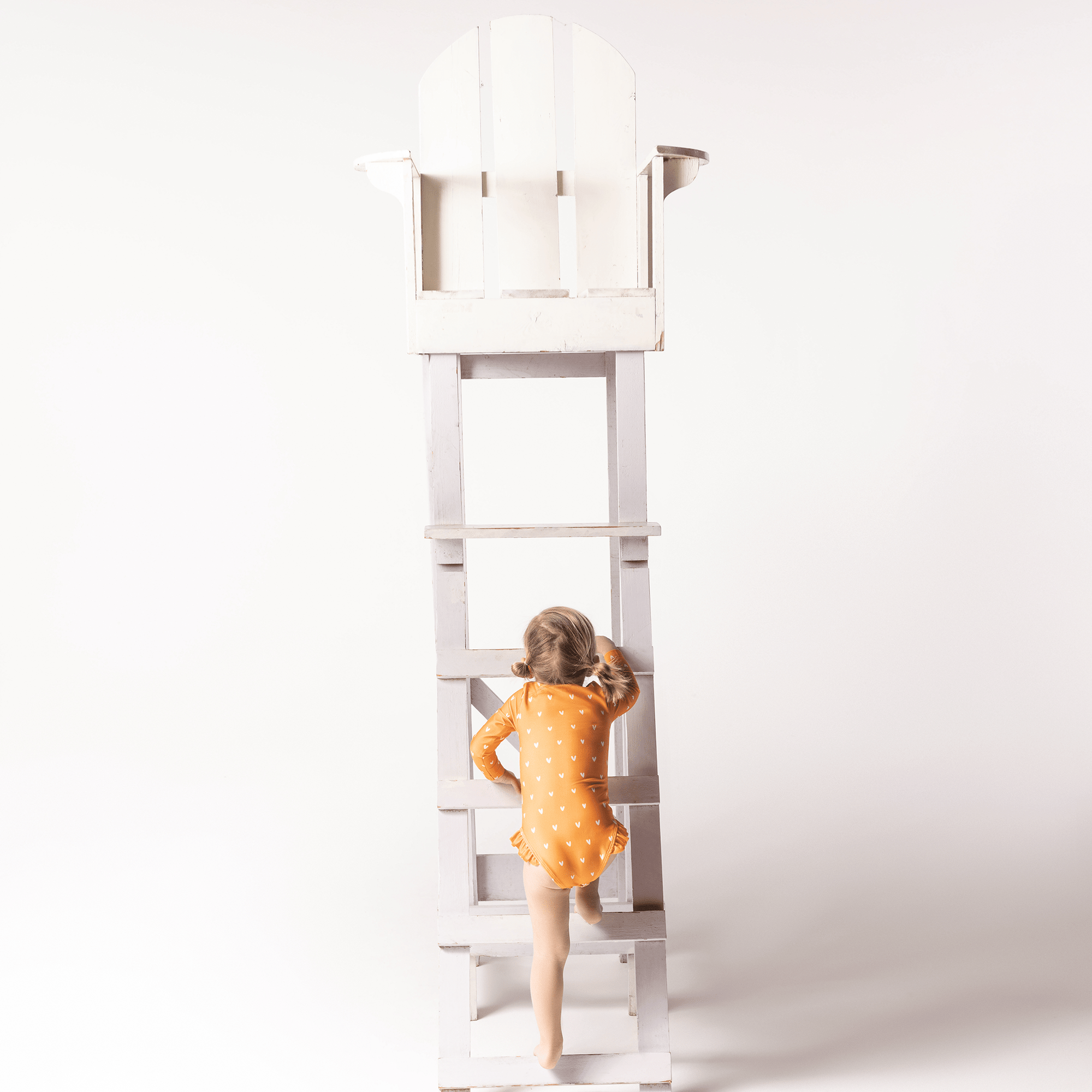 costume-intero-bambina-con-mani-lunghe-arancio-con-cuori-nuotare-essenziali-2
