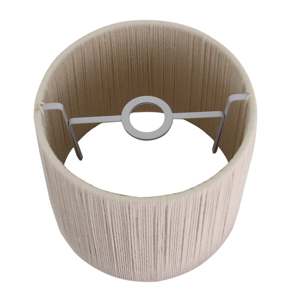 Zijaanzicht van de witte katoenen kap die zorgt voor een zachte lichtfiltering.