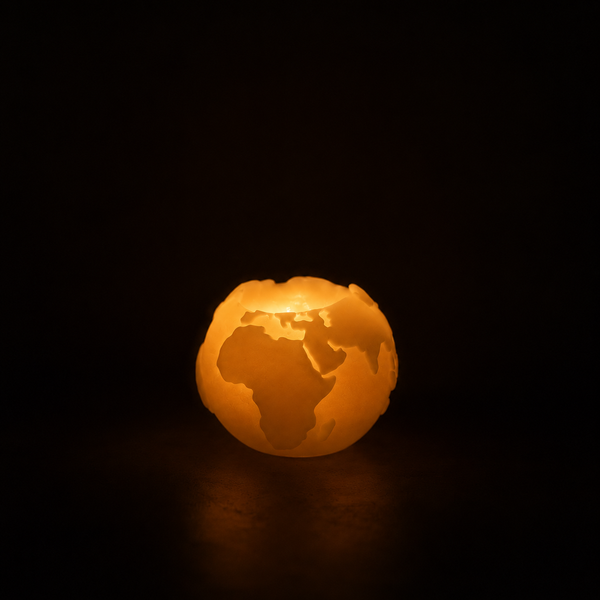 Handcrafted globe-shaped beeswax candle by CocoBee