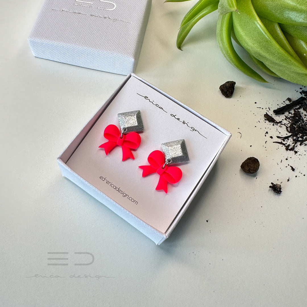 nœud X EXPANSION | rouge néon et argent