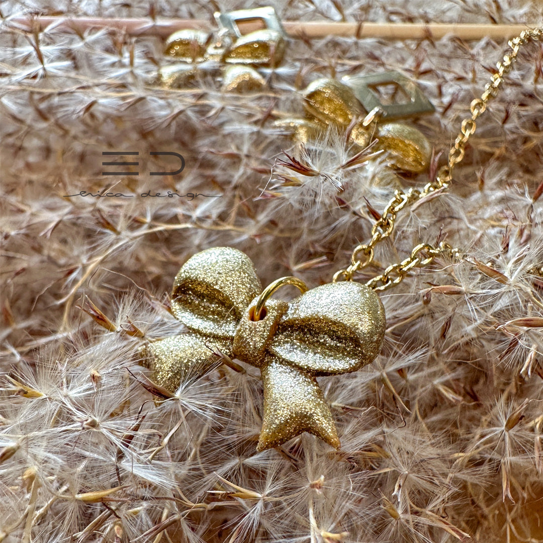 bow | gold glitter