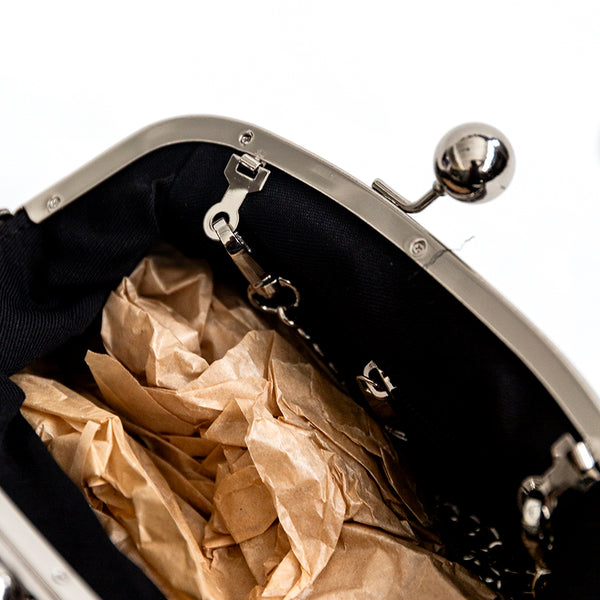 CLUTCH - Laminated leather clutch with bronze lynx print