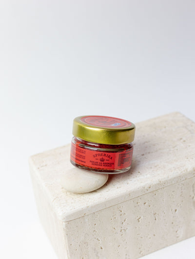 esferas rojas de arenque ahumado