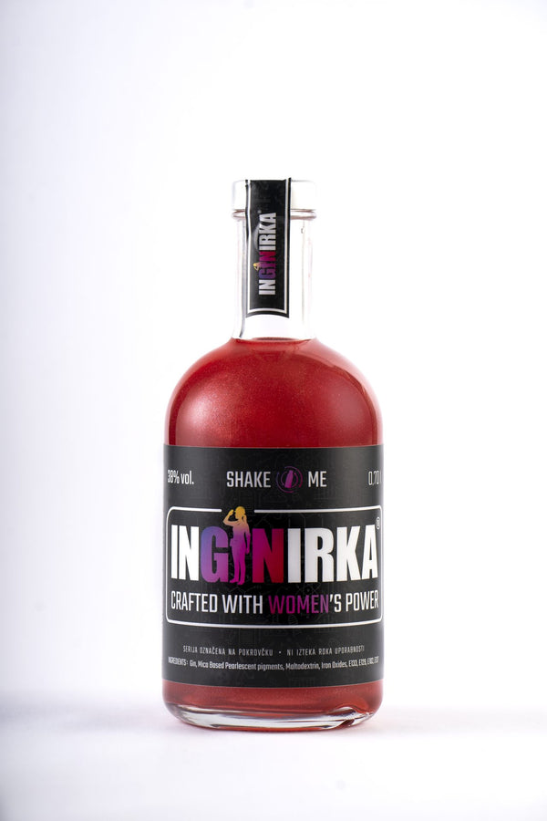 Red spirit bottle with a black label reading 'INGNIRKA' and 'CRAFTED WITH WOMEN'S POWER' visible on the front.