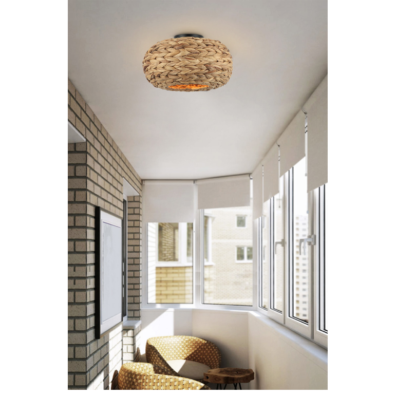 De bruine Nature Treccia plafondlamp heeft een organisch design.