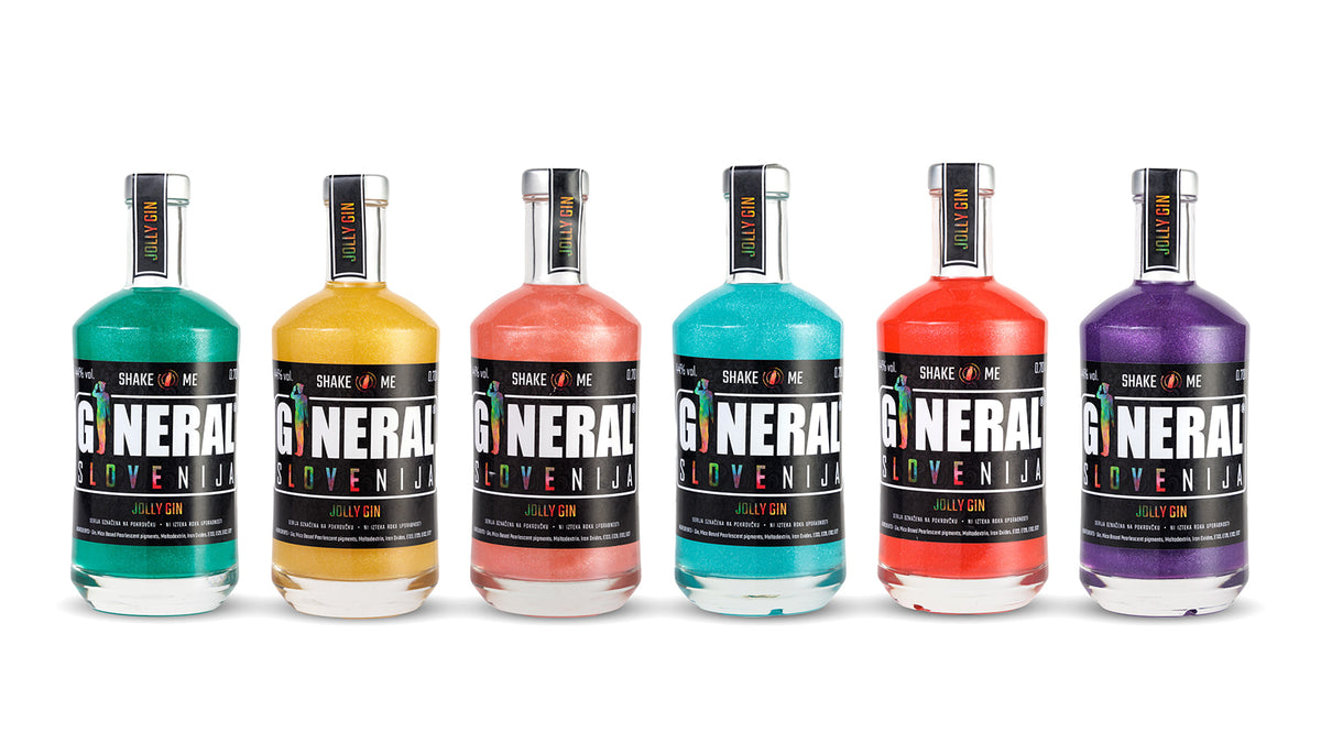 Six colorful gin bottles in a row on a white background: teal, yellow, pink, turquoise, red, and purple liquids.