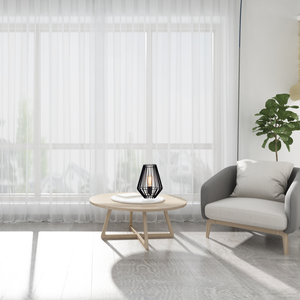 Een gedetailleerde blik op de zwarte Tavola tafellamp, perfect voor een industrieel interieur.