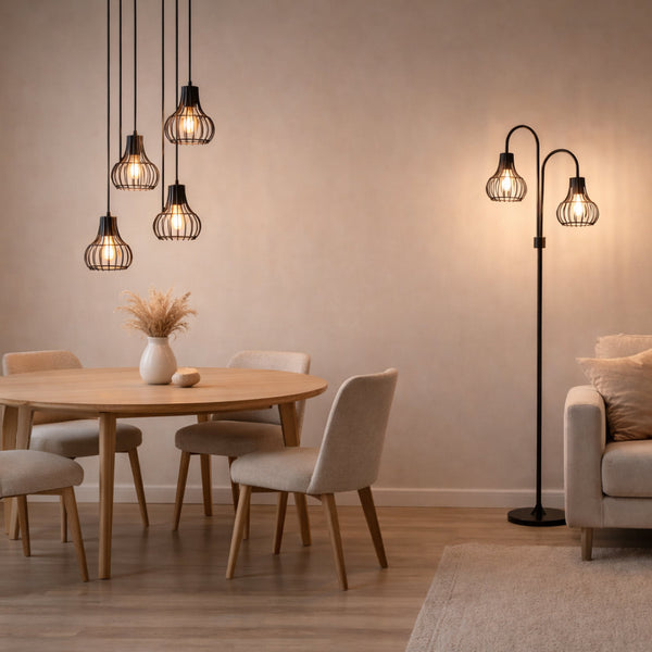 De zwart moderne Goccia vloerlamp met twee armen straalt industriële charme uit. Perfect voor een trendy woonkamer.